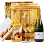 Geschenkset Nizza – Geschenkkorb mit Sekt Brut Chardonnay, Lindt Pralinen & Holzkiste