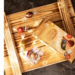 Geschenkset Nizza – Geschenkkorb mit Sekt Brut Chardonnay, Lindt Pralinen & Holzkiste